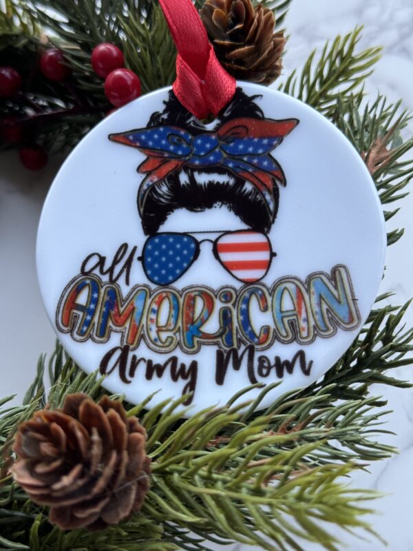 A christmas ornament that says all american army mom.