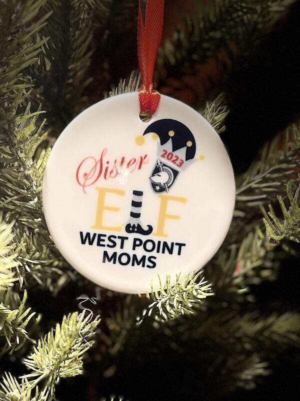 A christmas ornament that says sister elf west point moms.