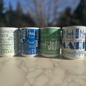 A picture of four different color cups with text on it